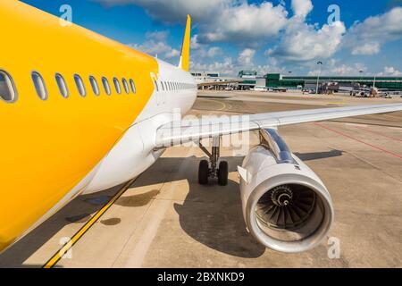 Airplane in Singapore Changi Airport in Singapore at summer day Stock Photo