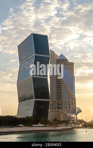 Zig Zag Towers: Also known as The West Bay Lagoon Plaza twin towers, or the dancing towers, are the highest and largest residential zig-zag twin tower. Stock Photo