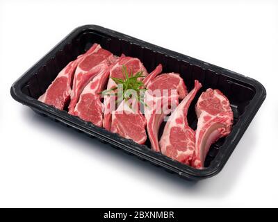 Supermarket packaged lamb chops  isolated against a white background Stock Photo