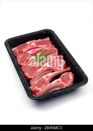 Supermarket packaged lamb chops  isolated against a white background Stock Photo