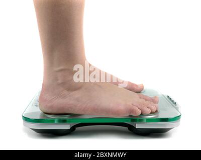 A set of bathroom scales isolated against a white background Stock Photo