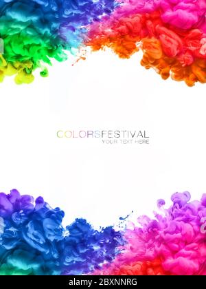 Colors festival. Acrylic ink in water. Multicolored explosions of swirling rainbow ink bordering white background. Includes copy space in center. Stock Photo