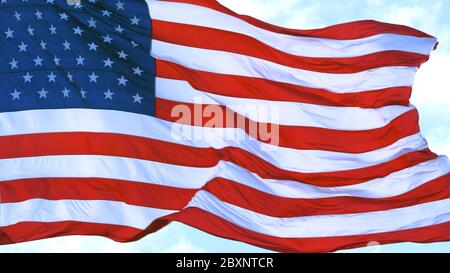 US flag - American Flag waving in wind Stock Photo