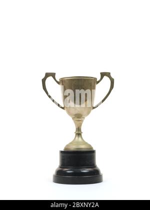 An old tarnished trophy isolated against a white background Stock Photo