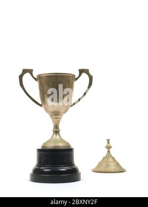 An old tarnished trophy isolated against a white background Stock Photo