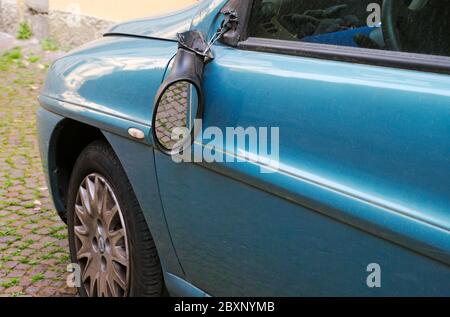 car with a broken side view mirror Stock Photo