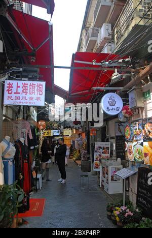 Tianzifang in Shanghai, China. Tianzifang district is an area of alleyways in Shanghai known for art and craft stores, coffee shops and art studios. Stock Photo