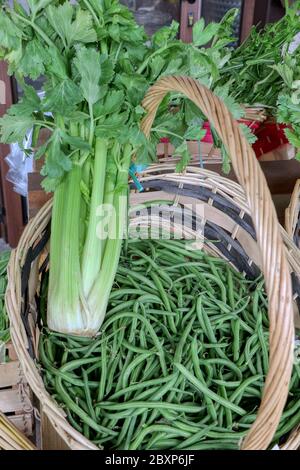 Close up of green beans and celery for sale in a vegetable market Stock Photo