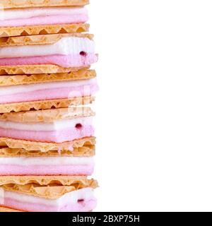 A pile of pink and white marshmallow wafers. Isolated on white background with space for your text. Stock Photo