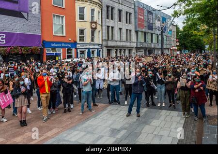 Cork, Ireland. 8th June, 2020. Between 1,000-1,500 people gathered on Grand Parade today under the Black Lives Matter banner to protest against the killing of the unarmed black man in America, George Floyd. Credit: AG News/Alamy Live News Stock Photo