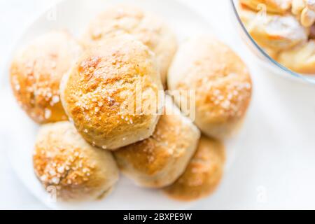 Fresh salty bread buns pastry topped with salt Stock Photo