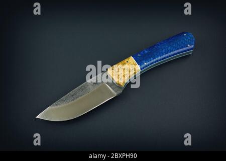 Fixed blade knife isolated on black background. Stock Photo