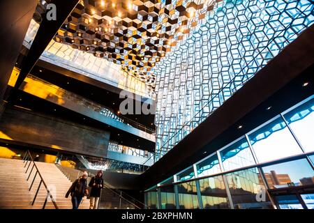 Harpa Concert Hall view during blue hour which is a concert hall and conference centre in Reykjavik, Iceland Stock Photo