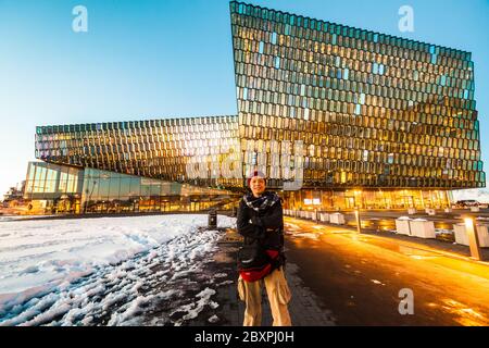 Harpa Concert Hall view during blue hour which is a concert hall and conference centre in Reykjavik, Iceland Stock Photo