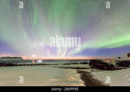 Beautiful Aurora Borealis or better known as The Northern Lights view in Iceland during winter Stock Photo