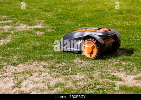 Umea, Norrland Sweden - May 24, 2020: an advanced robotic lawnmower Stock Photo