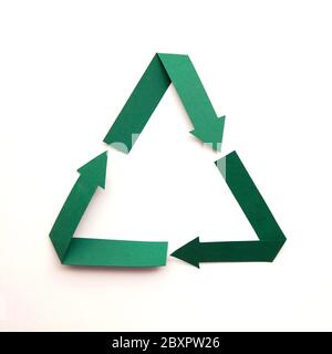 Recycling symbol made from green folded paper Stock Photo