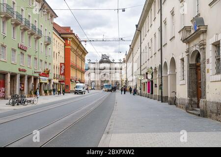 INNSBRUCK, AUSTRIA - MAY 11, 2013: The south end of the Maria Theresien Strasse in the old city center of Innsbruck, Austria on May 11, 2013.  The fam Stock Photo