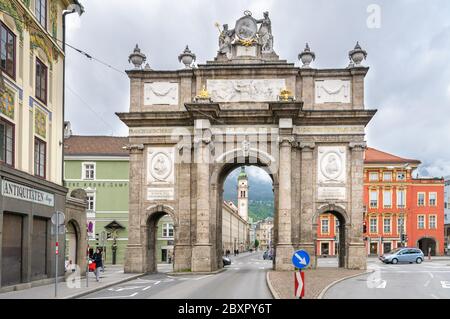 INNSBRUCK, AUSTRIA - MAY 11, 2013: The south side of the Triumphal Arch in the old city center of Innsbruck, Austria on May 11, 2013.  Through the gat Stock Photo