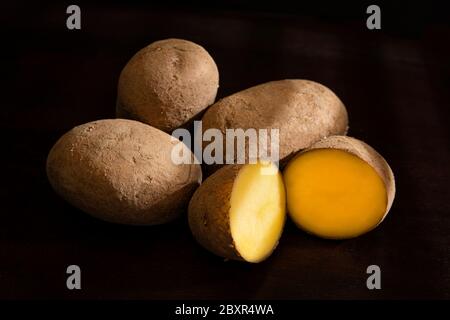 Close-up of potatoes on a black background Stock Photo