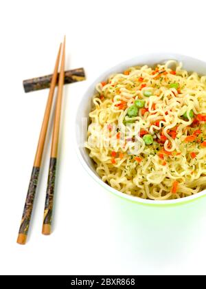 Cooked instant noodles isolated against a white background Stock Photo