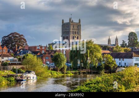 The Romanesque tower of Tewkesbury Abbey church along the Avon in Gloucestershire, England Stock Photo