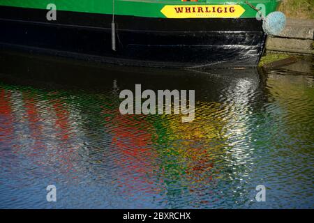 Reflections of a canal boat on the water. Stock Photo