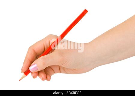 Red pencil in hand Stock Photo