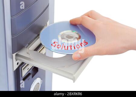 Hand and computer disk solution Stock Photo