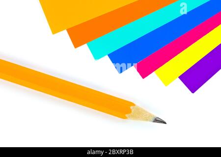 Multicolored paper and pencil Stock Photo