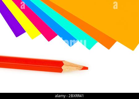 Multicolored paper and pencil Stock Photo