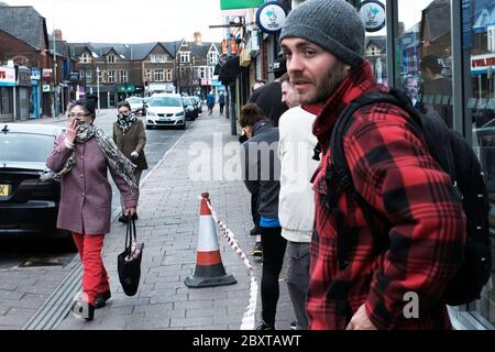 2 metres distancing in the line outside Tesco in Roath, Cardiff.Wales UK Stock Photo