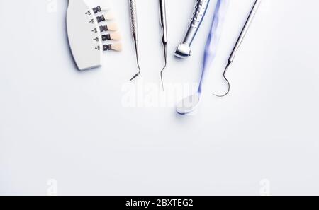 dental tools on white background with copy space Stock Photo