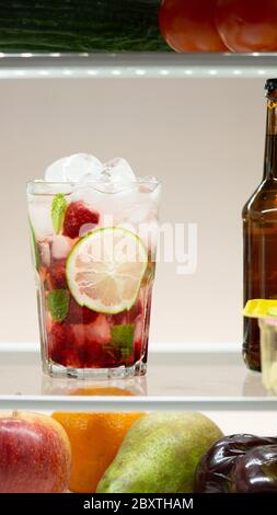 Raspberry mojito cocktail in a fridge. Cold, fresh, summer drink.  Stock Photo