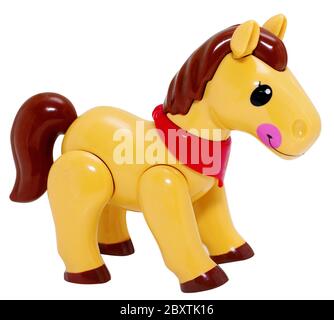 Colorful plastic toy horse on a white background. Stock Photo