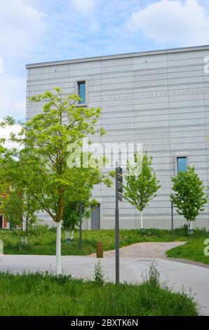 Weimar, Germany,new Bauhaus Museum building in summer with blooming vegetation Stock Photo