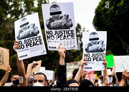 Protester with sign at demonstration honoring George Floyd, in the Highland Park neighborhood of Los Angeles, California Stock Photo