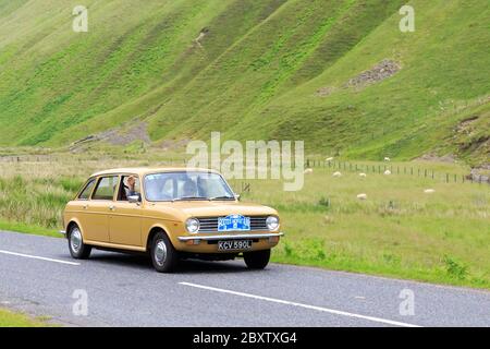 MOFFAT, SCOTLAND - JUNE 29, 2019:  Austin Maxi car in a classic car rally en route towards the town of Moffat, Dumfries and Galloway Stock Photo