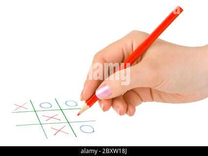 Hand with pencil and game Stock Photo