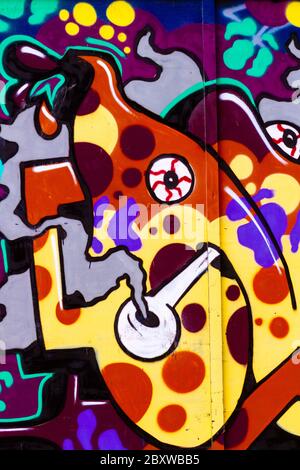 Graffiti of a man smoking a crack pipe Stock Photo