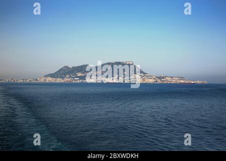 Rock of Gibraltar seen from the mediteranean sea. Gibraltar is a British Overseas Territory located at the southern tip of the Iberian Peninsula. Stock Photo