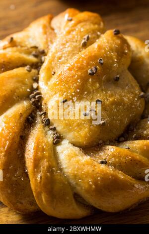 Sweet Homemade Swedish Cardamom Buns with Sugar for Breakfast Stock Photo