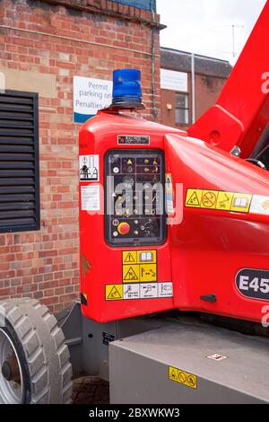 Cherry picker control panel Stock Photo - Alamy
