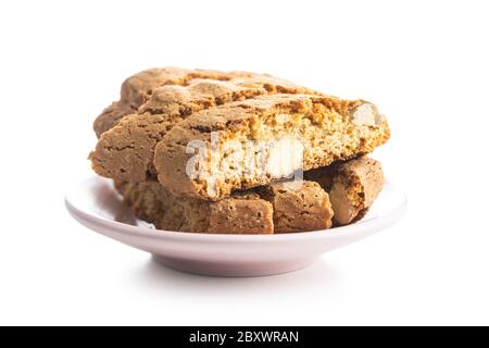 Sweet italian cantuccini cookies. Almonds biscuits on plate isolated on white background. Stock Photo