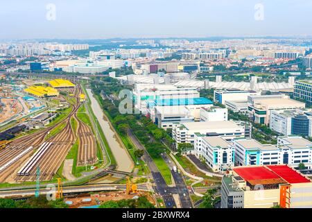 Aerial view of Singapore industrial area, with factories blocks, railroad, urban landscape Stock Photo