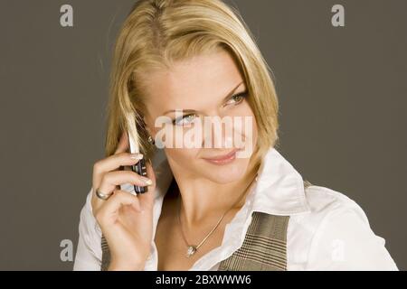 Junge, blonde Frau, telefoniert mit Handy, young blonde woman, call with mobile Stock Photo