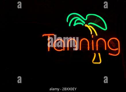 Neon Tanning Sign Stock Photo