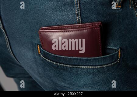 wallet in back pocket with filter effect retro vintage style Stock Photo