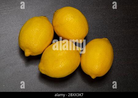 Lemon isolated on wooden background Stock Photo