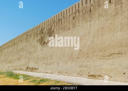 Ancient medieval big protective reinforcement wall with adobe clay material. Near East or central asian rural old country Stock Photo